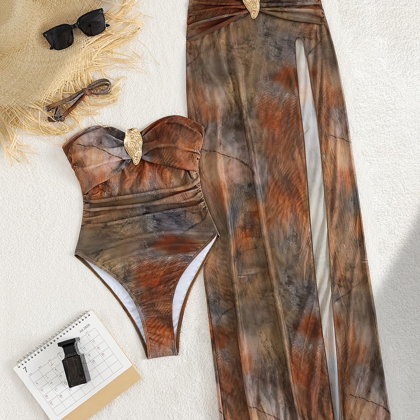 This New Vintage Stone Pattern Printed Two-Piece Swimsuit Features a Sexy Strapless Design with Detachable Shoulder Straps, Paired with an Elegant Long Wrap Skirt And Adorned with Stylish Metallic Additions, Making It a Must-Have for Women